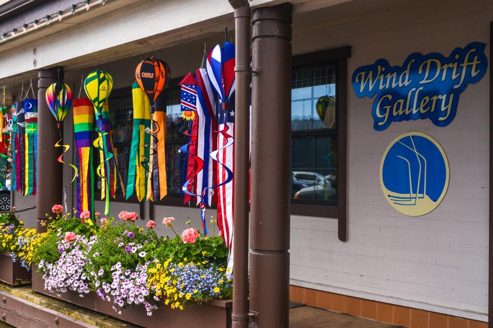 Wind Drift Gallery with hanging kites in downtown Florence