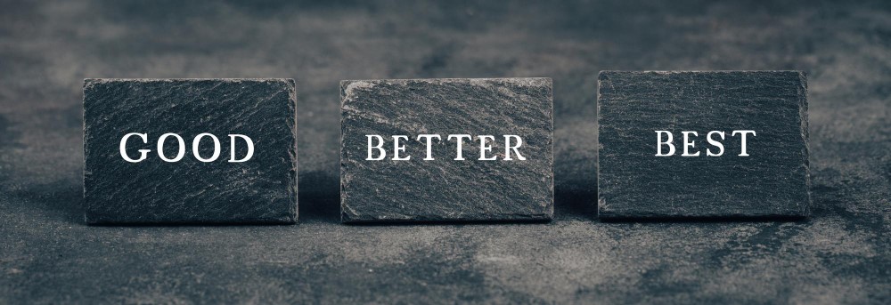 Three slate stones labeled Good, Better, and Best